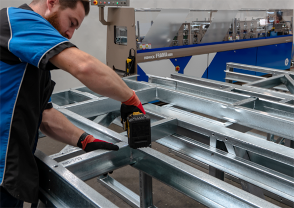 light gauge steel framing being assembled