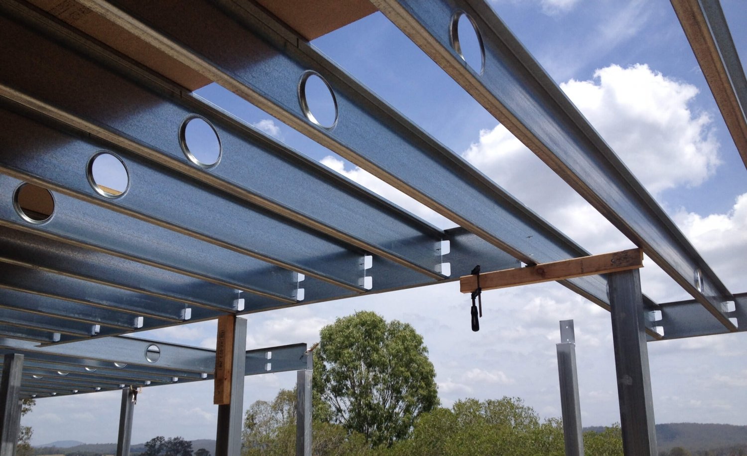 Detail of floor joist connection from the build of Paris Homes in New Zealand.
